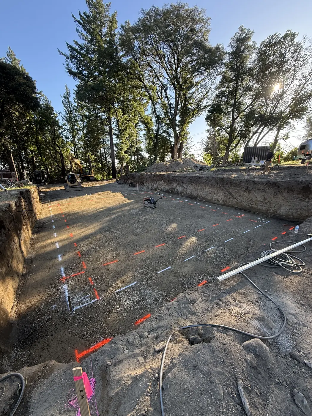 Foundation footprint formed and laid out on a graded pad